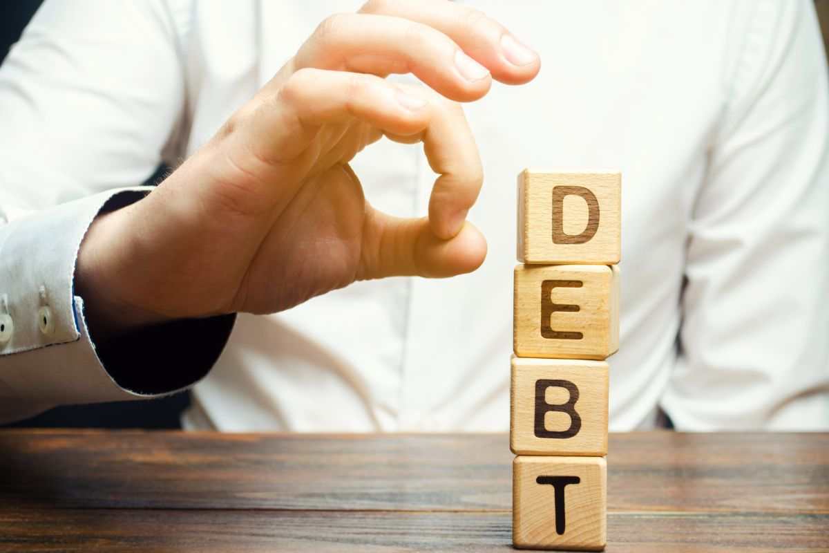 come cancellare debiti legalmente